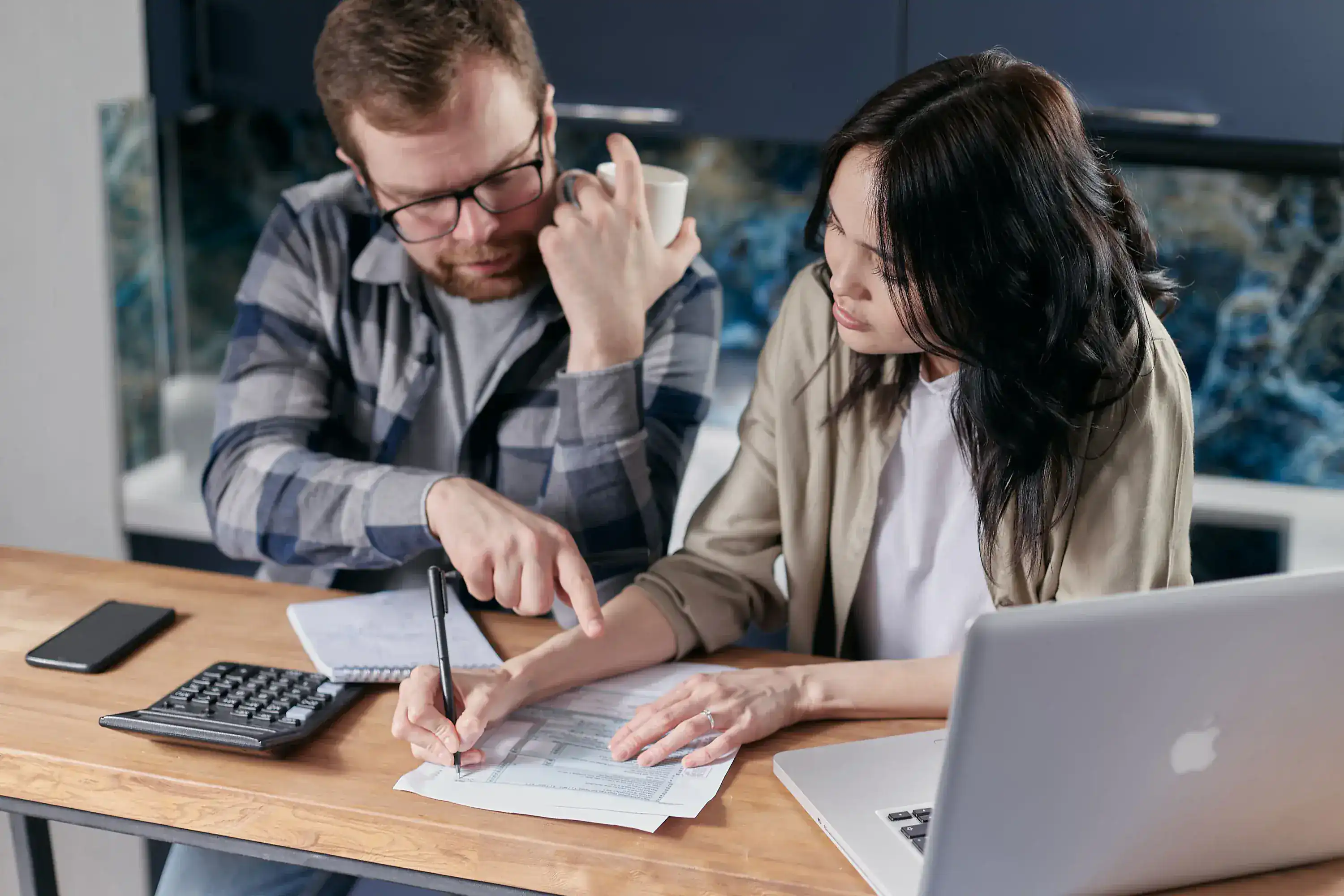 Two people reviewing household finances together