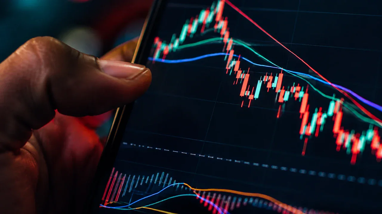 Investor reviewing a market chart before making a sell decision