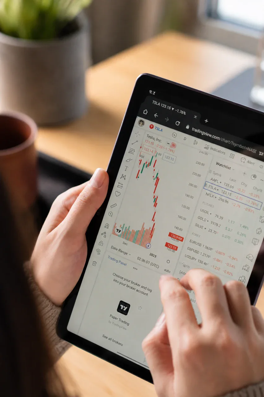 Portfolio positions and allocation being reviewed on a tablet