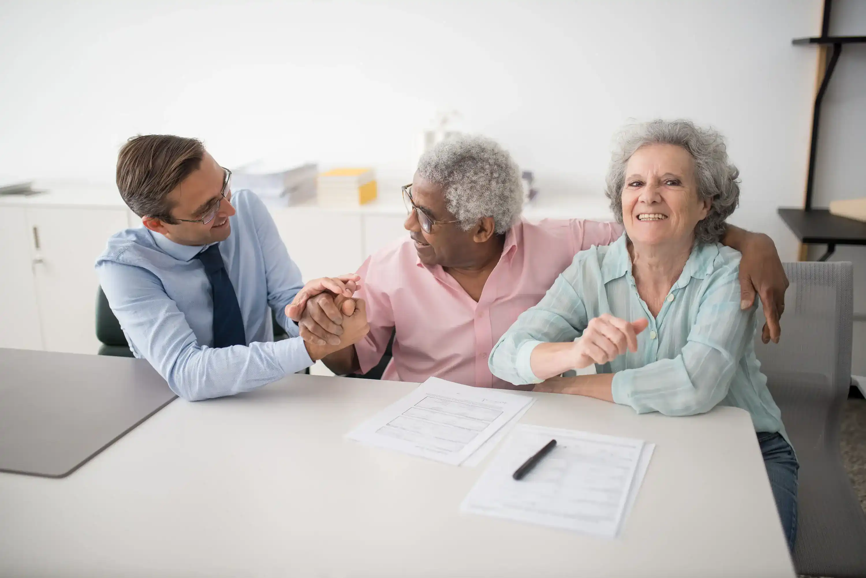 Older investors speaking with a financial professional